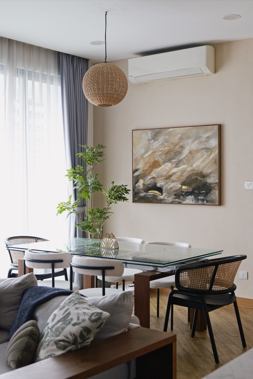 Mismatched dining chairs with glass dining table